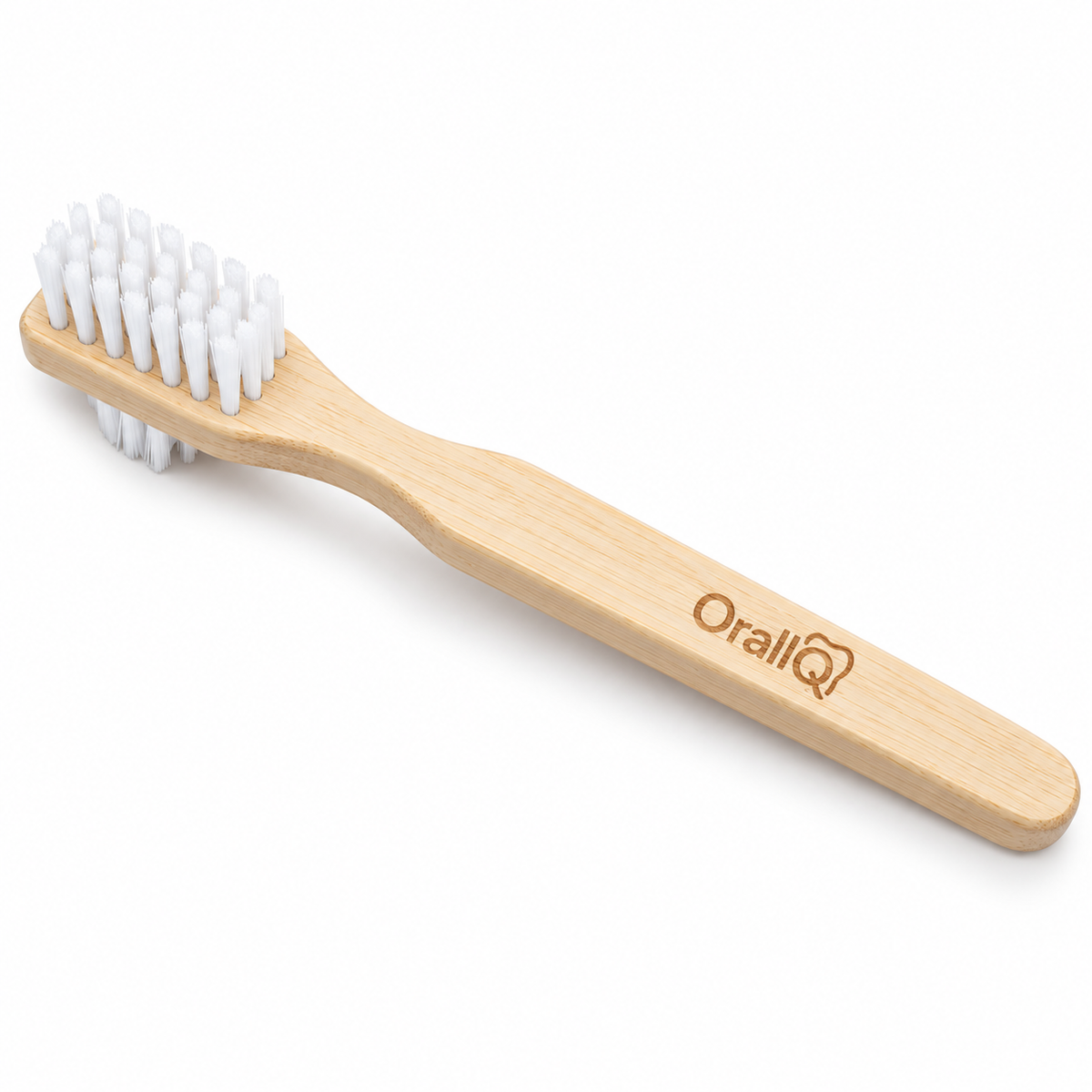 OralIQ double-sided bamboo denture brush showing the engraved OralIQ handle