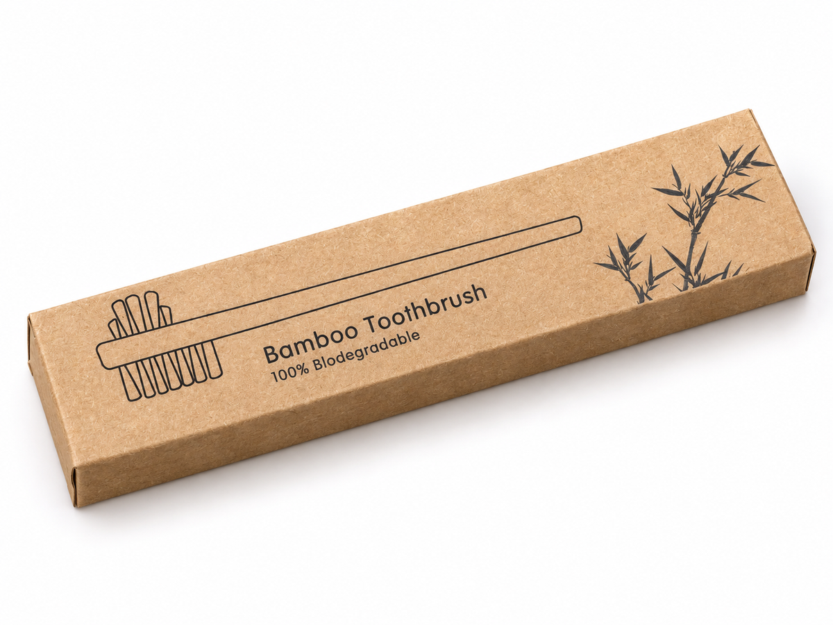 OralIQ Bamboo Double-Sided Denture Brush — packaging view on white